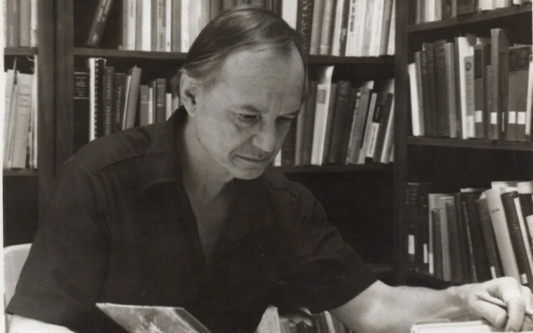 The classicist Peter Green at his desk